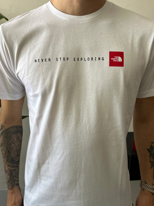 T-Shirt The North Face "NEVER STOP WEARING" Bianca Uomo
